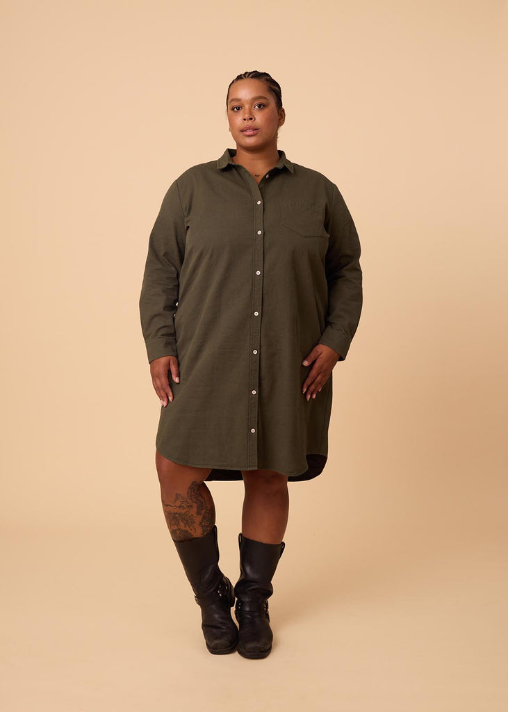 plus size person in an olive green shirt dress