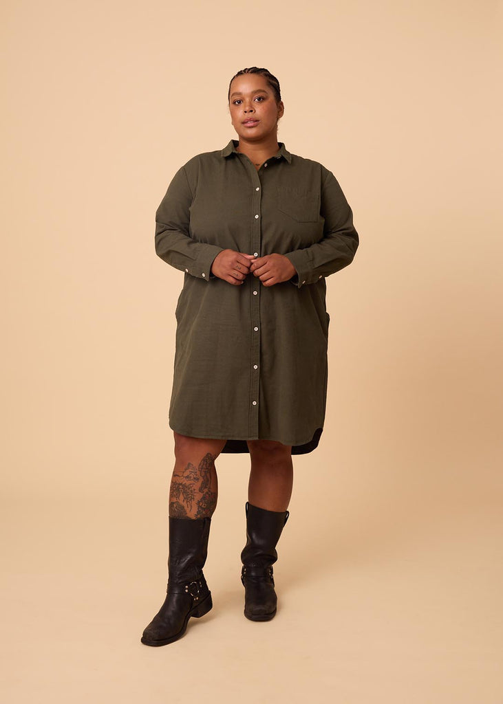 plus size person in an olive green shirt dress