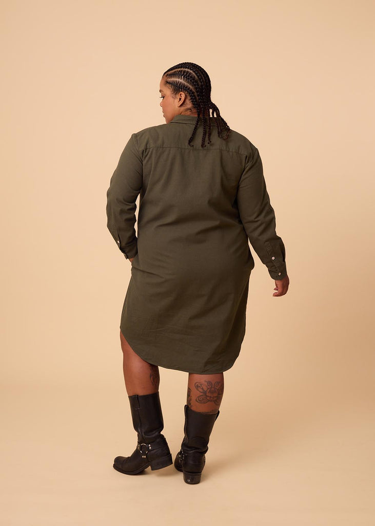 plus size person in an olive green shirt dress