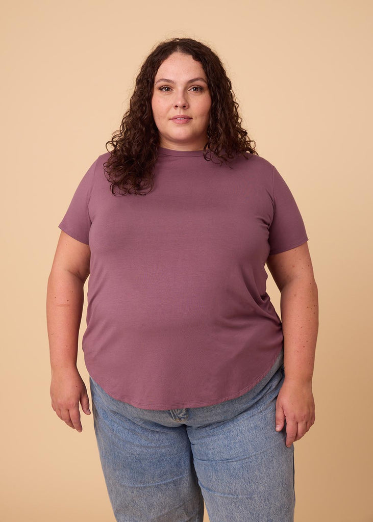 plus size woman in a violet tee shirt