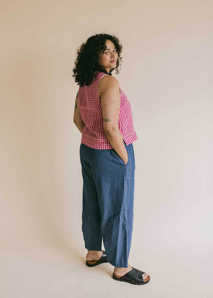 mid size woman wearing wide leg denim pants